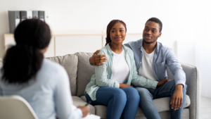 a doctor explaining the best ivf protocols for couple
